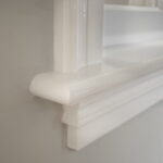 Wit gelakte houten lijst details