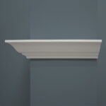 Witte wandplank op grijze muur